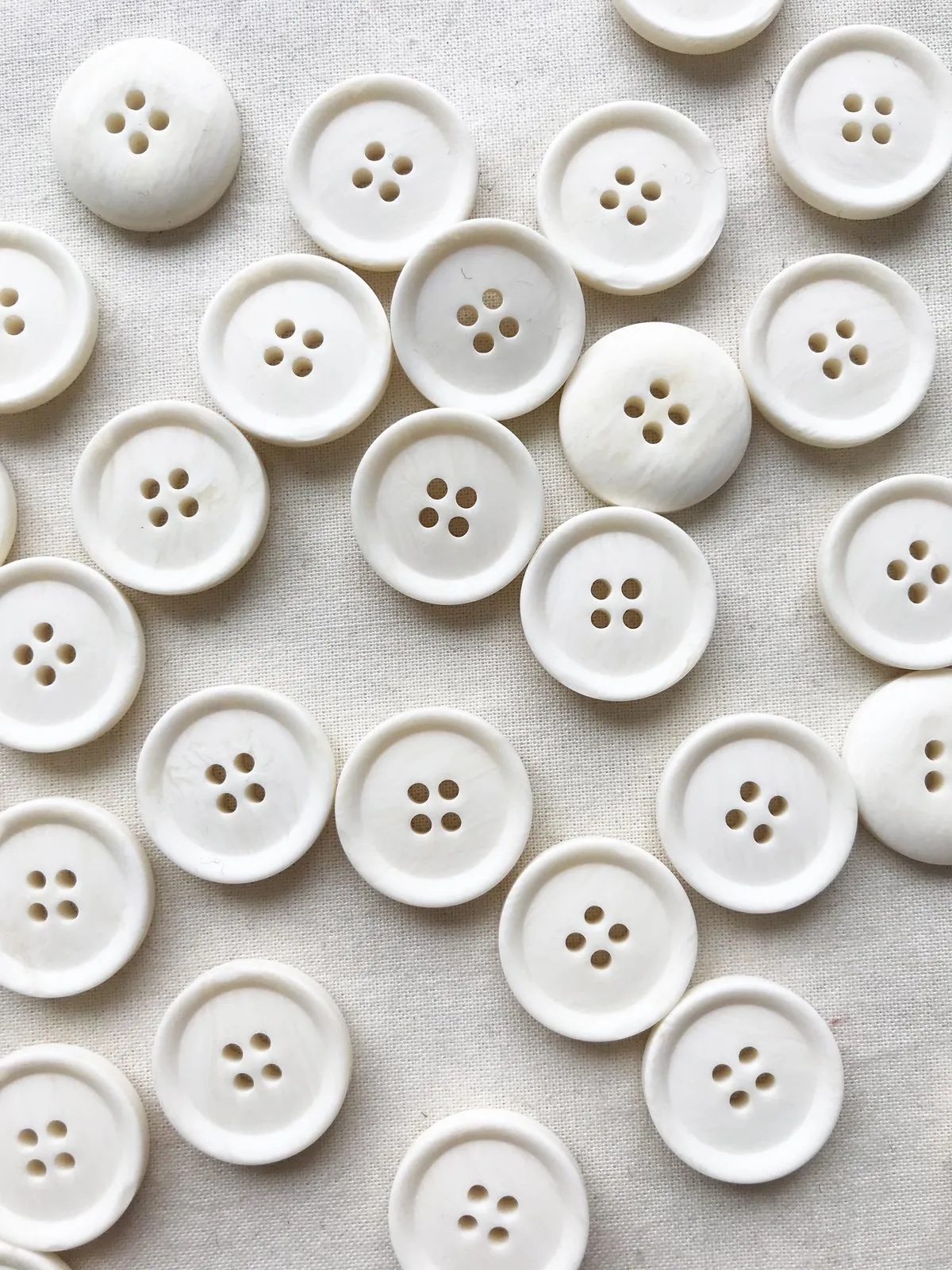 Smooth Matte Basic Ivory Button Per Dozen